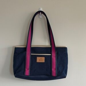 The Sak Navy and Magenta Bag